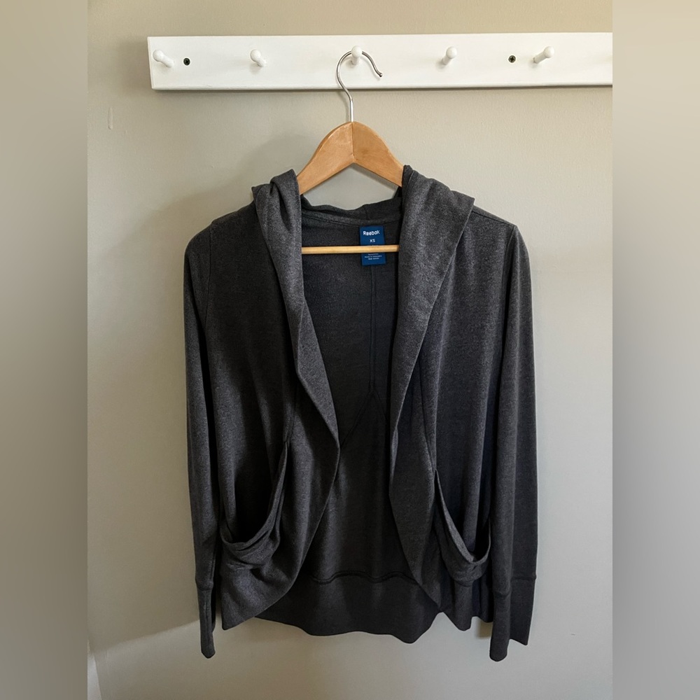Gray Reebok hoodie with pockets- size xs